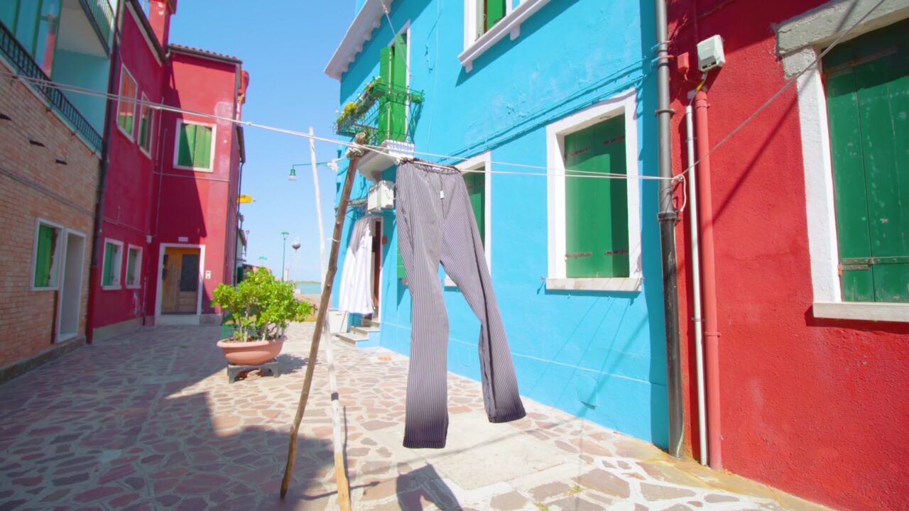 Clothes drying on clothesline between semi-detached houses