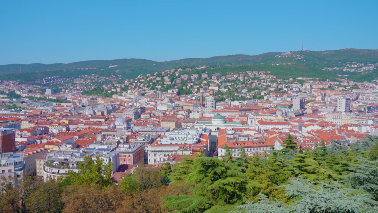 Old town panorama against mountains view from forestry hill