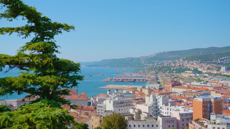 Impressive view of ancient town near sea and mountains