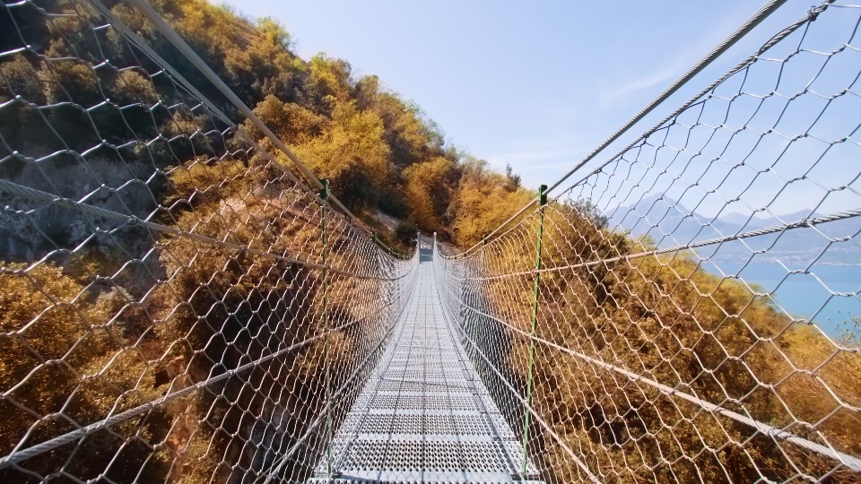 Long bridge with mesh fencing built near lake Garda in Italy