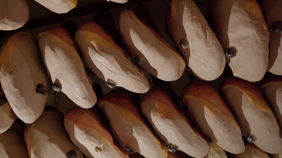 Fresh ham hangs from ceiling to air and reduce moisture