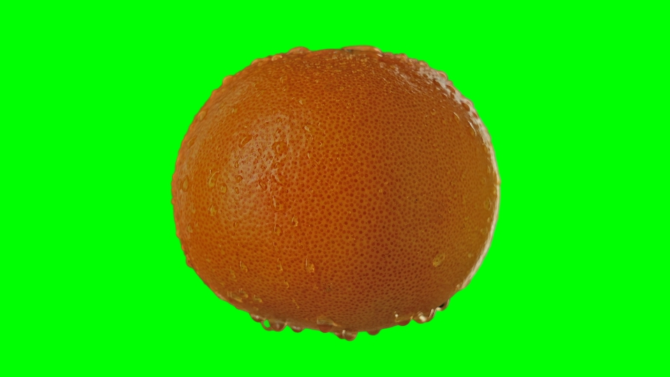 Tasty and wet orange on green screen for chroma key