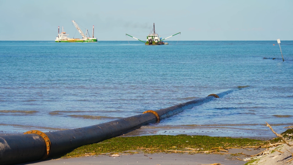 A tube ends up from the beach under the sea