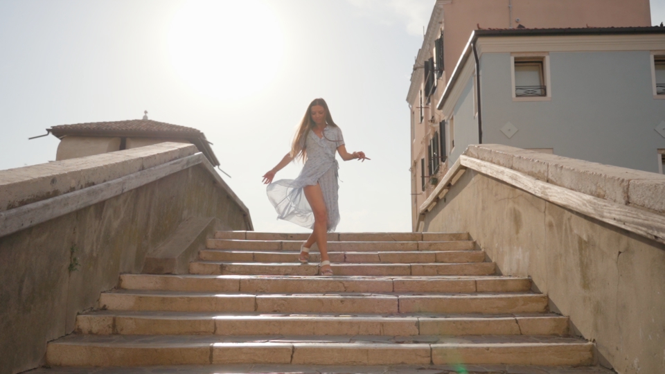 Elegant Staircase Dance with a Fascinating Woman