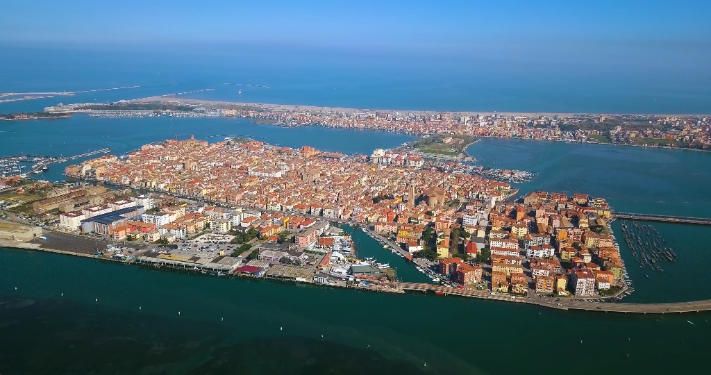 Aerial view of Chioggia and Sottomarina and the sea on the horizon