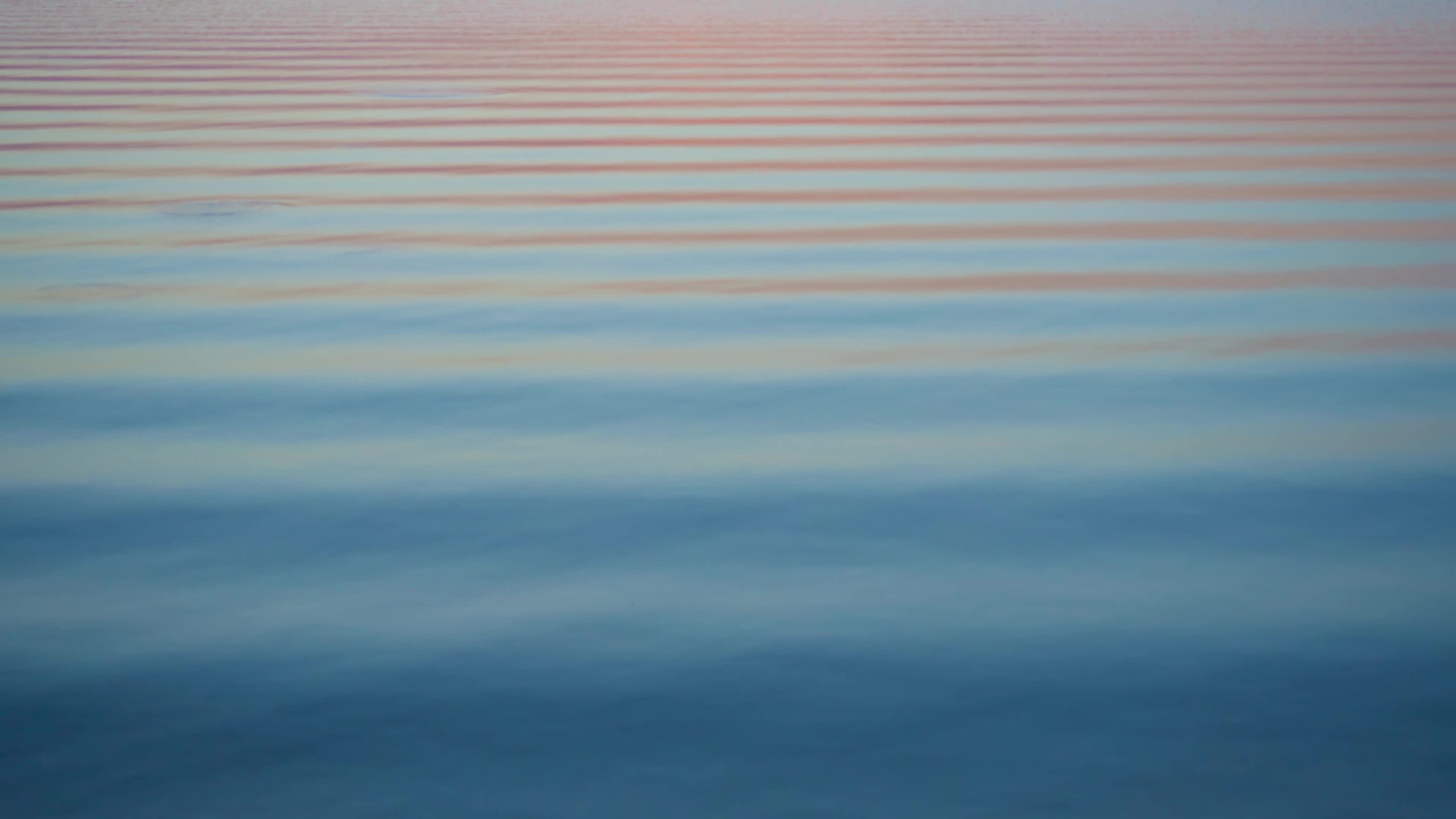 Calm water surface with slight waves