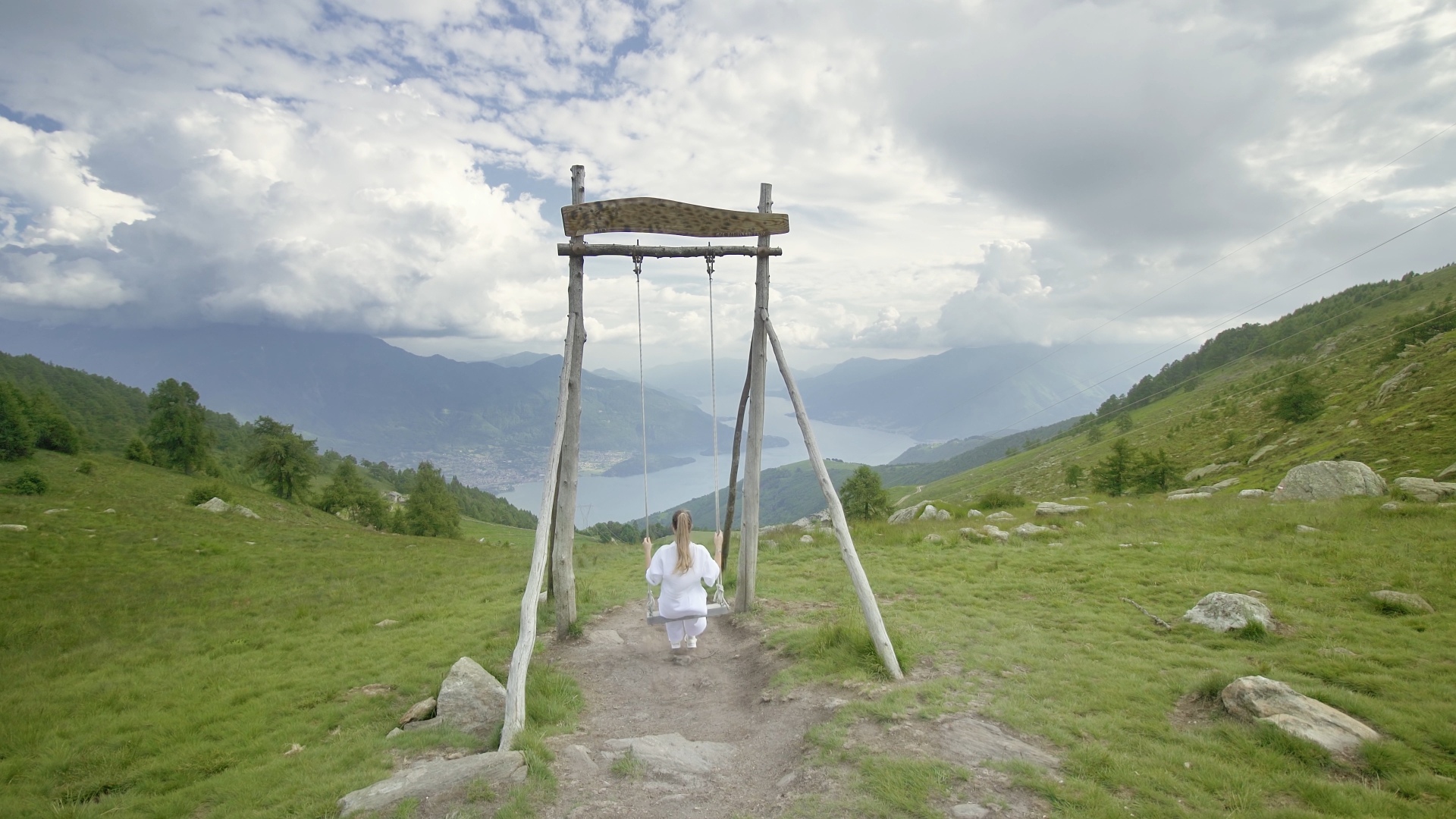 Swinging Above Majestic Mountains