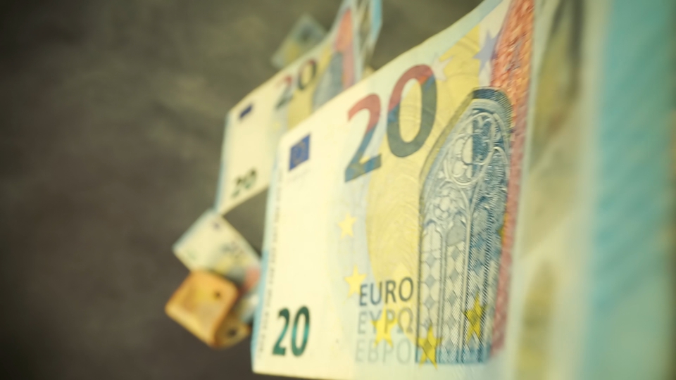 Euros fall from above in slow motion