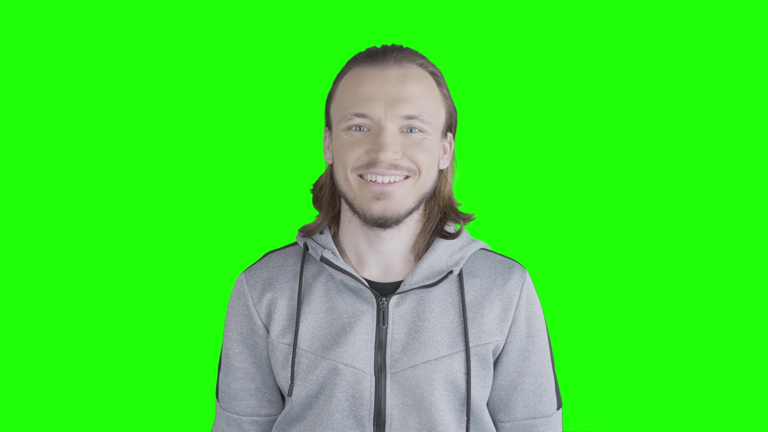 Man smiles on chroma key