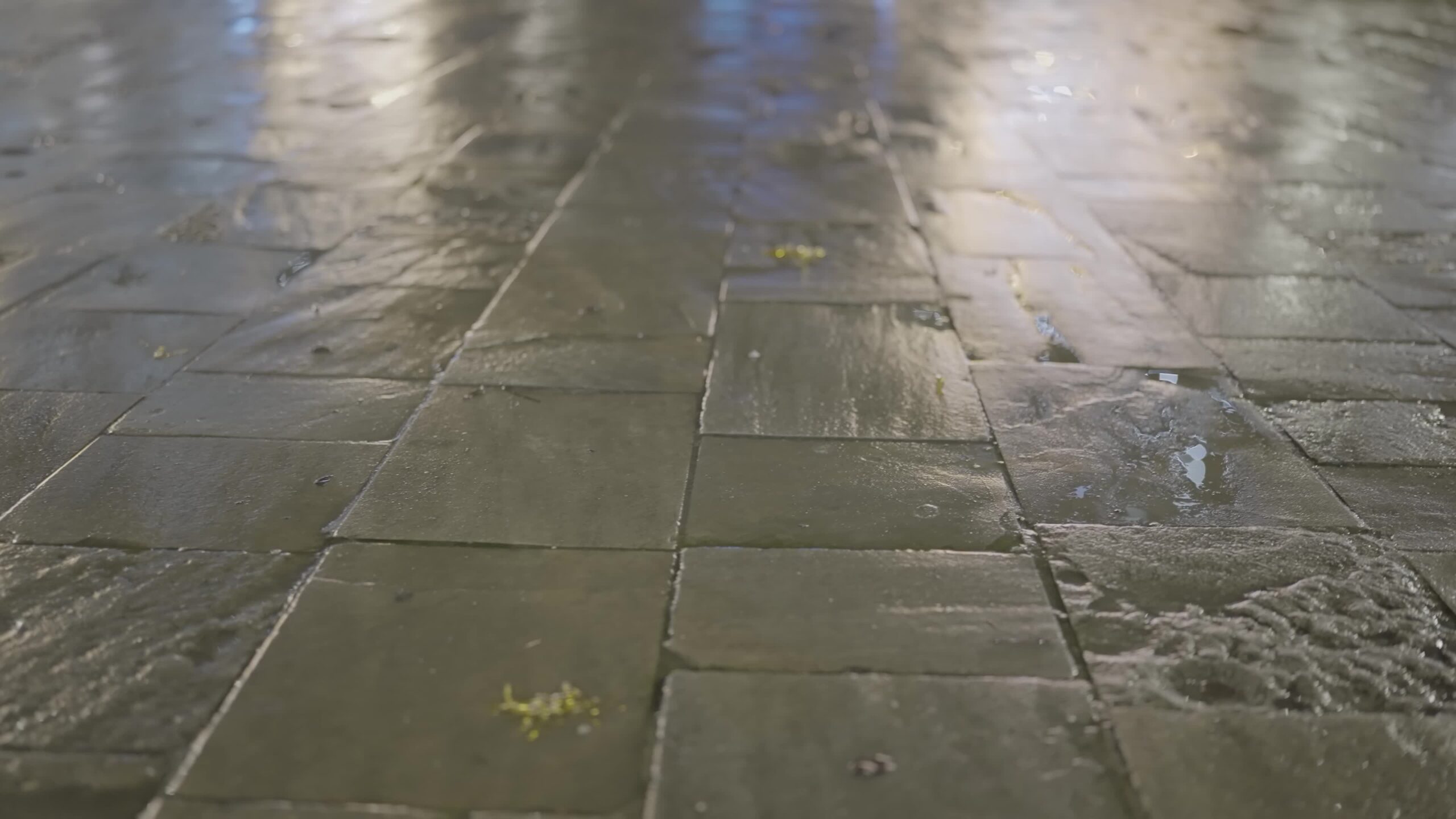 Ancient Brick Road: Nighttime Reflections After the Rain